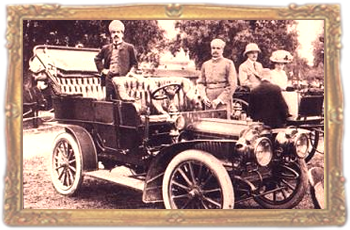 Nizam VII of Hyderabad poses in a car, one of the large fleet owned by him.